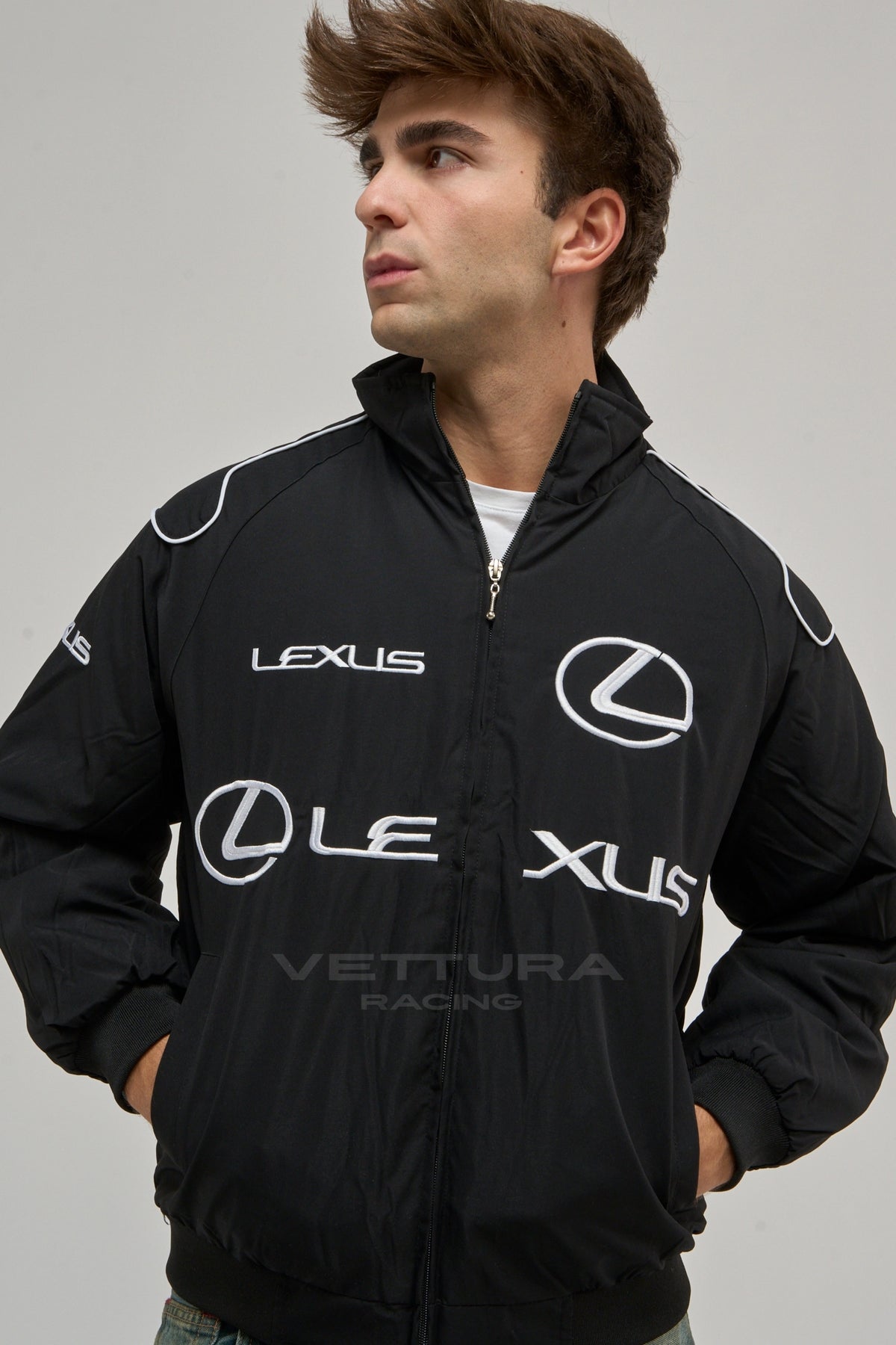 Model wearing the black Lexus vintage racing jacket, front view