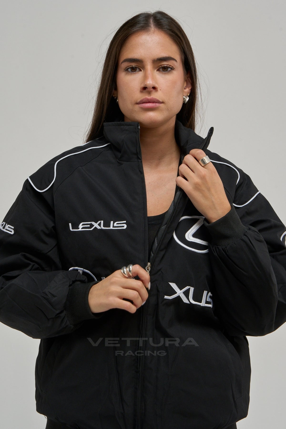 Woman wearing the black Lexus vintage racing bomber jacket