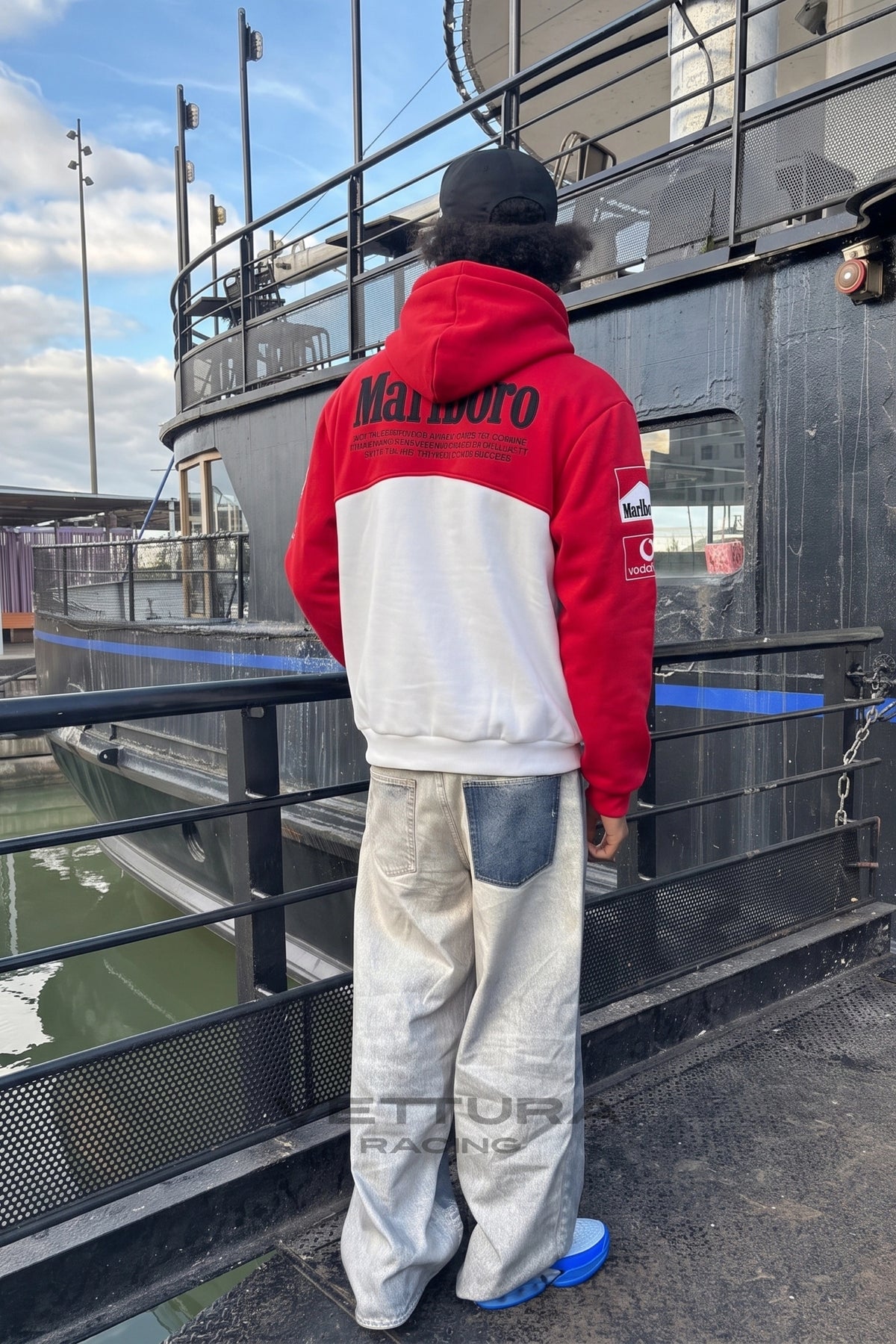 Detail of the red and white racing panels and full zip on the Marlboro Ferrari hoodie