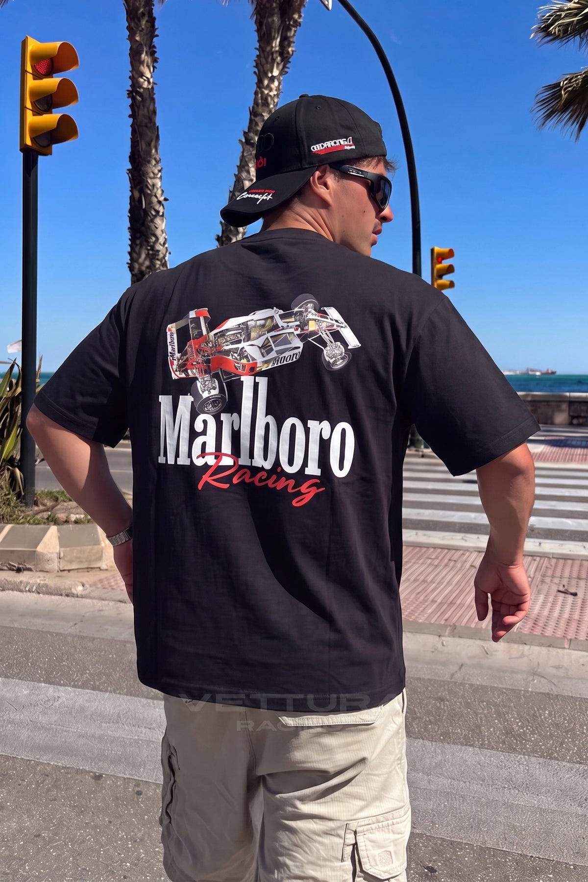 Close view of the Marlboro chest badge on the black F1 racing tee