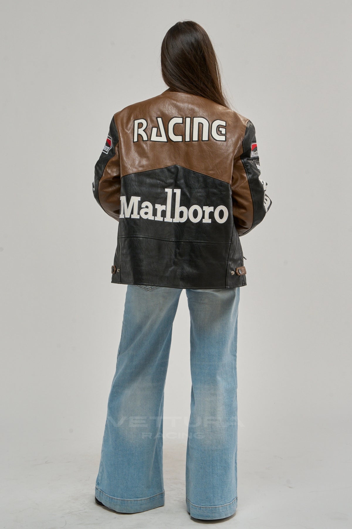 Marlboro brown leather jacket on a model, sleeve wordmark detail