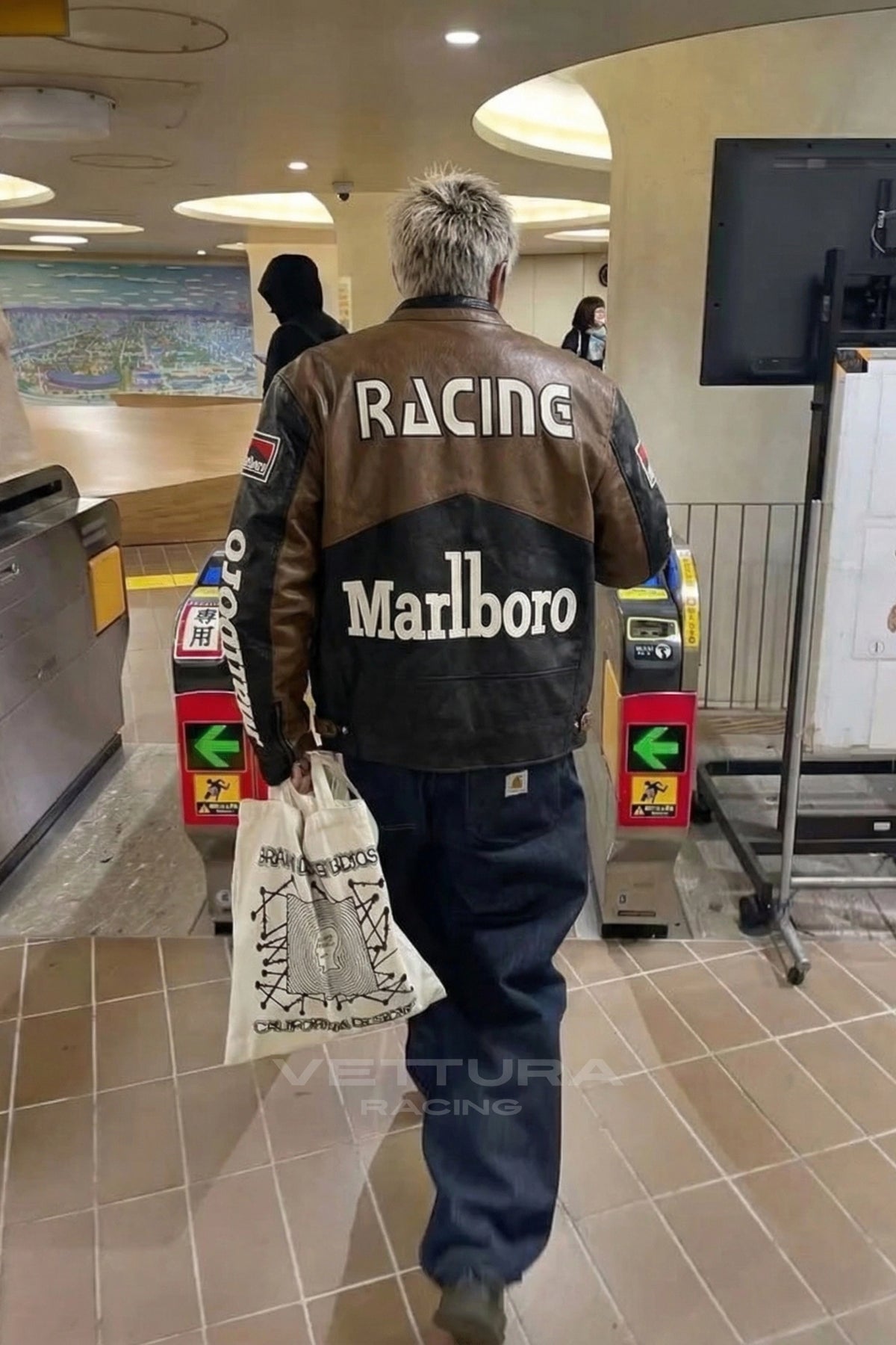 Marlboro brown racing leather jacket photographed outdoors