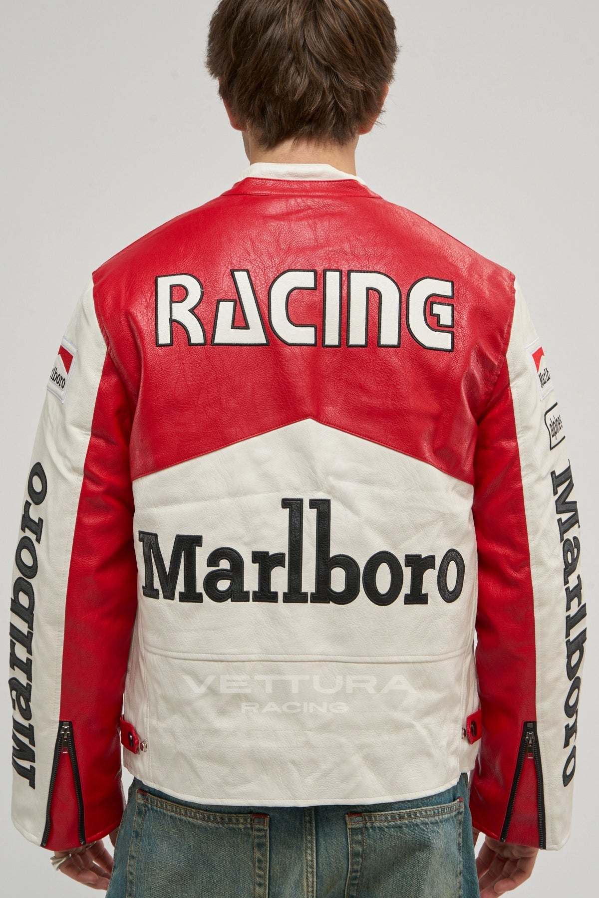 Back of the red and white Marlboro racing leather jacket on a model