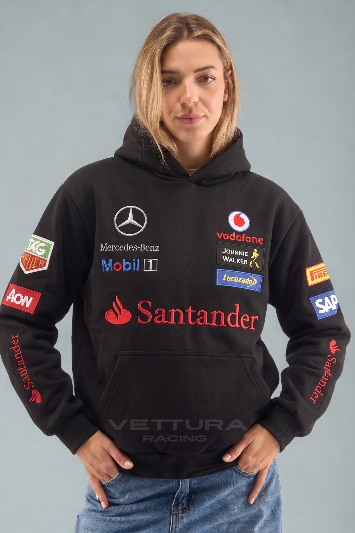 Mercedes-Benz racing hoodie styled with jeans in daylight