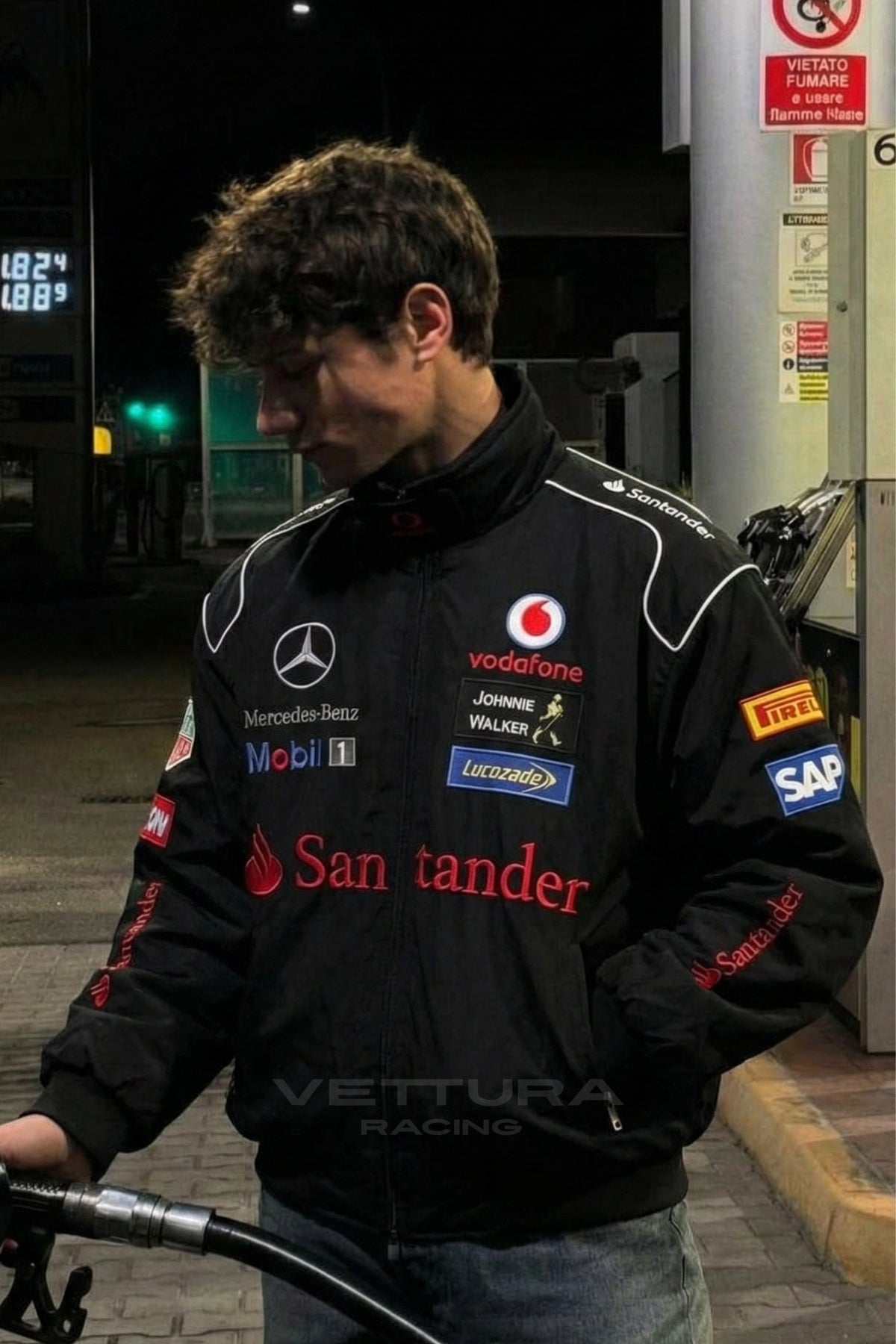 Street style look at night with the black Mercedes-Benz Santander F1 jacket