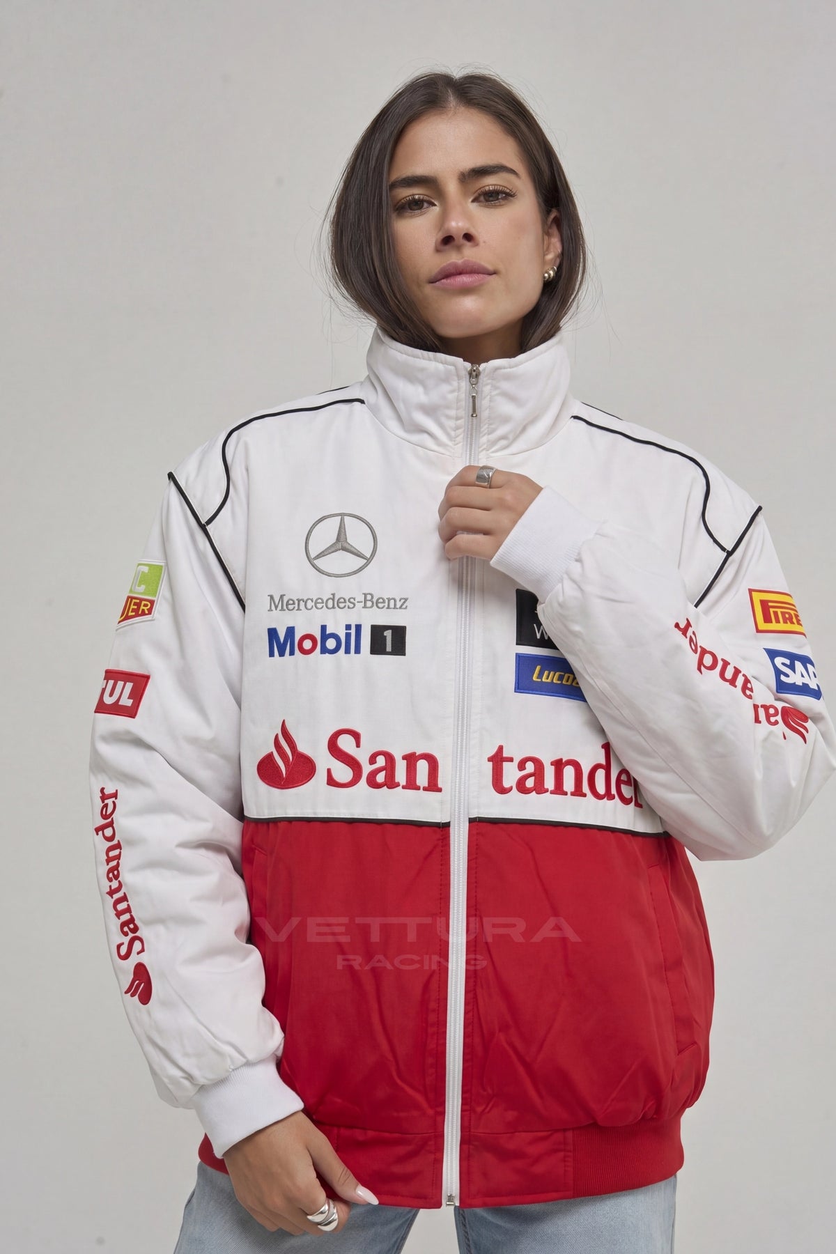 Mercedes-Benz white racing jacket on a model, front view with sponsor patches