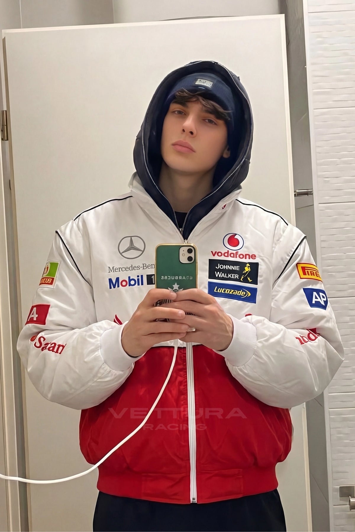 Close view of the Vodafone and Mobil 1 patches on the Mercedes-Benz jacket