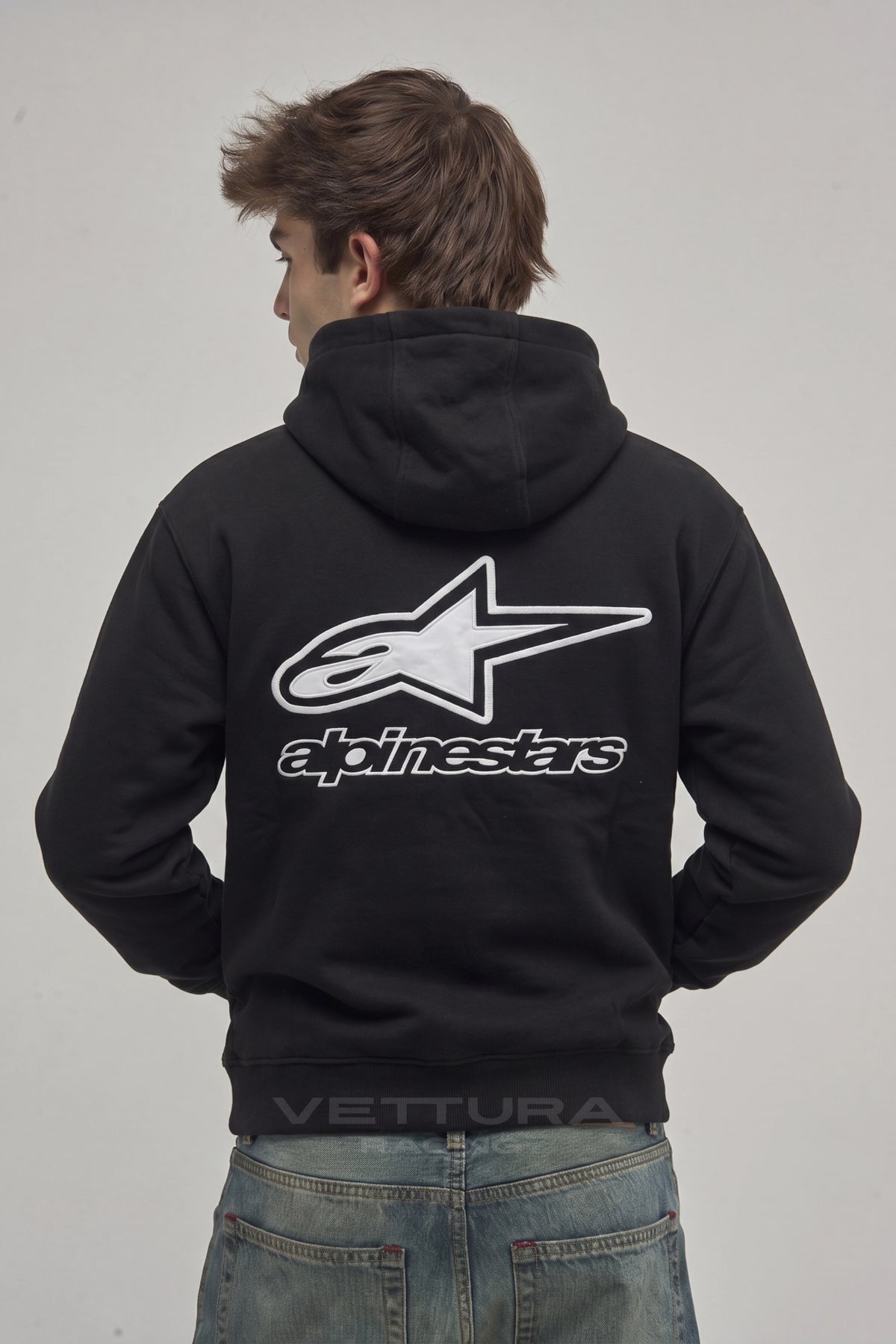 Red Bull Racing embroidered hoodie styled with jeans in daylight