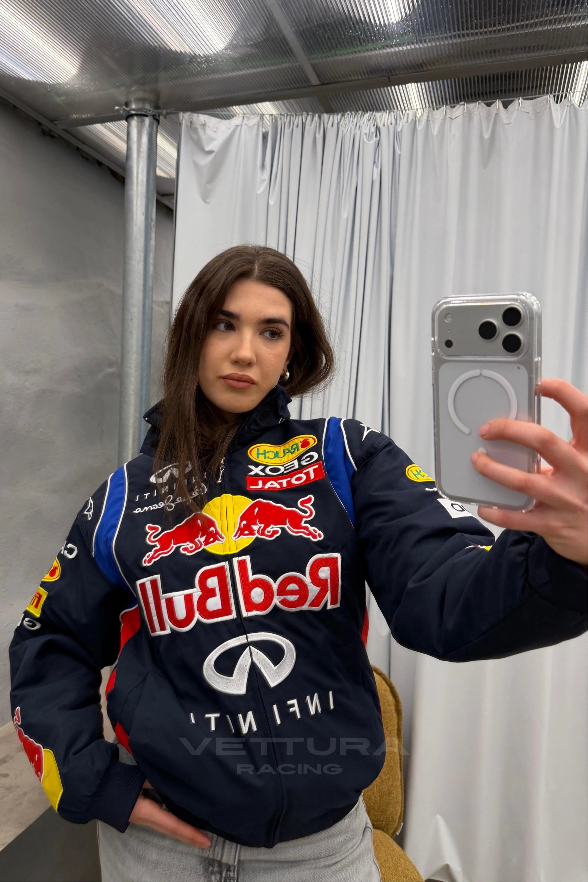 Mirror selfie wearing the Red Bull F1 racing jacket