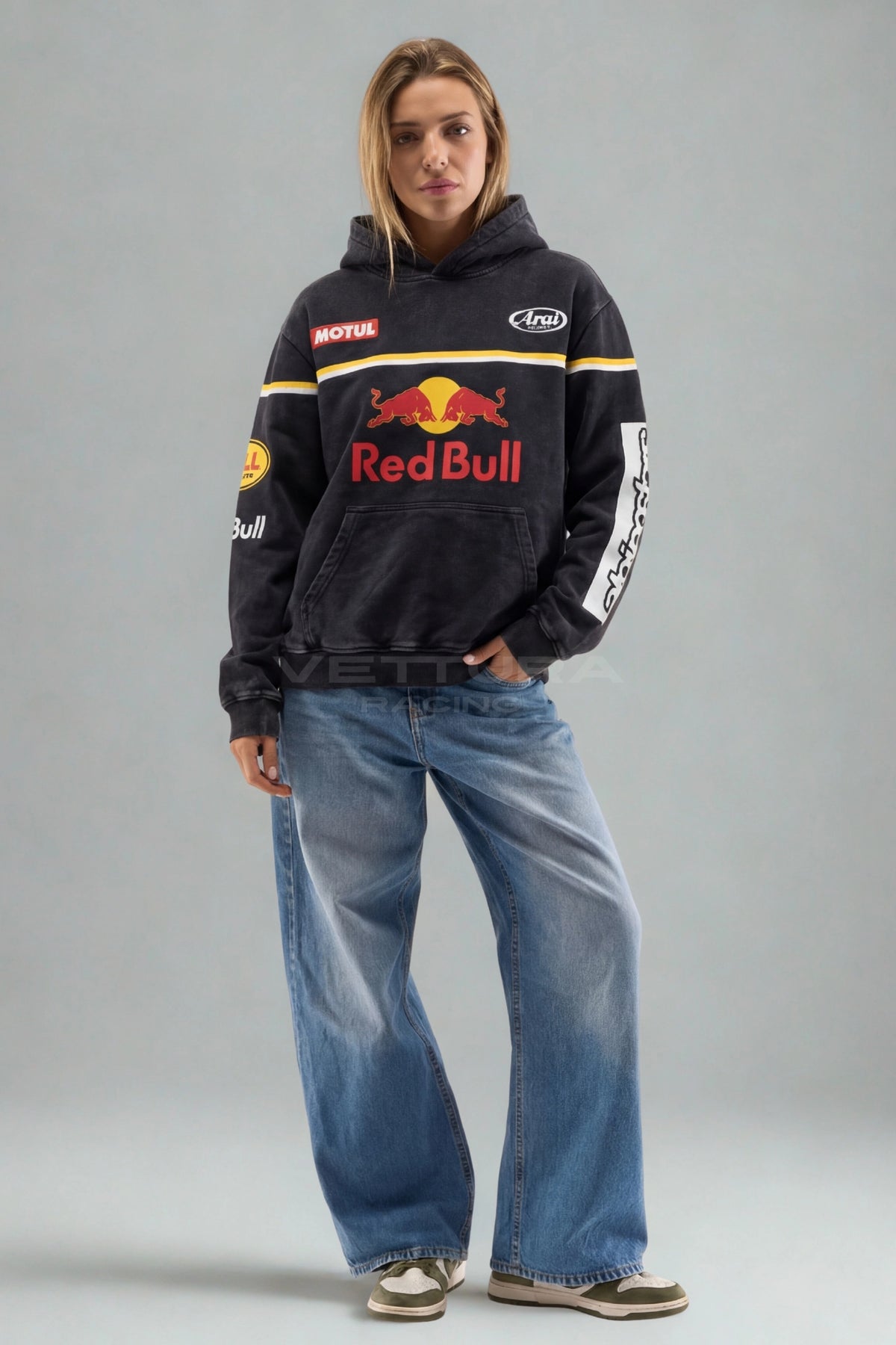 Red Bull Racing carbon wash hoodie on a model, sleeve sponsor detail