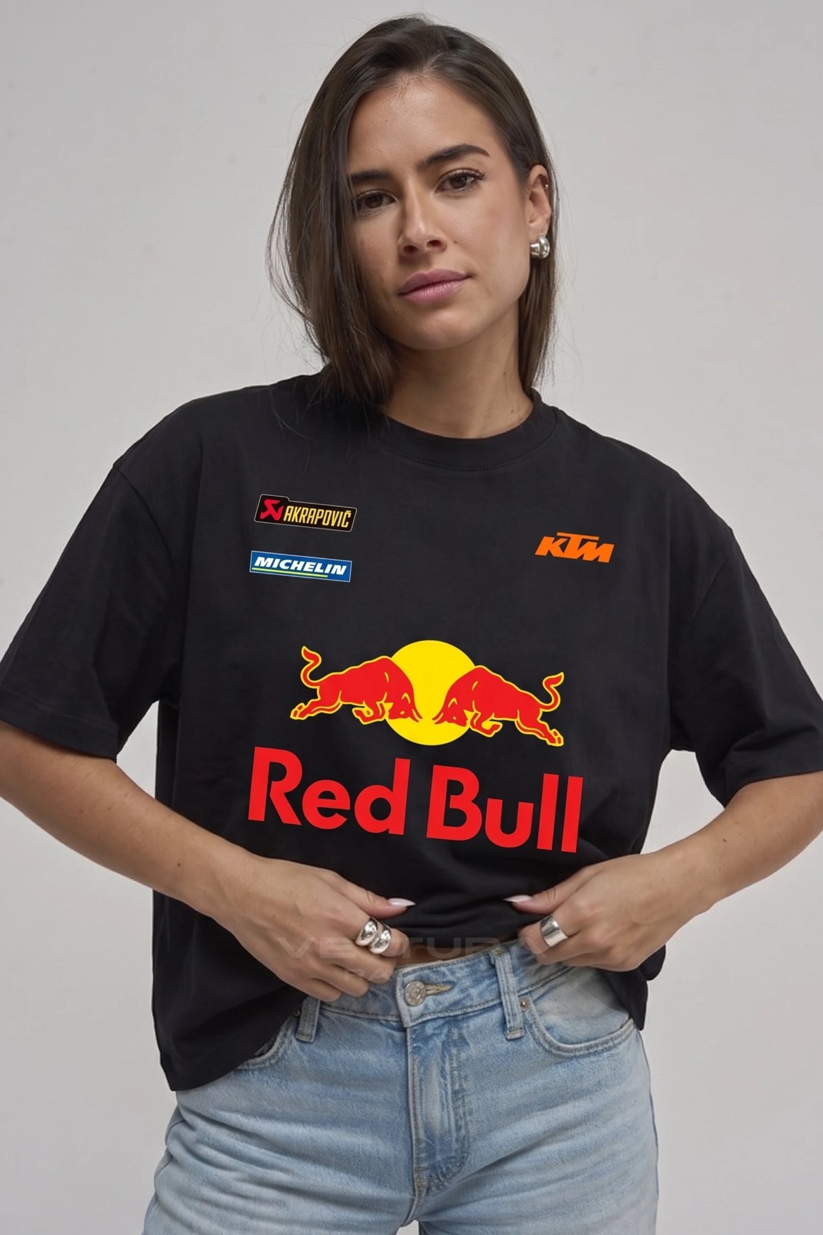 Woman wearing the Red Bull racing t-shirt classic edition, front view with the Michelin and KTM prints