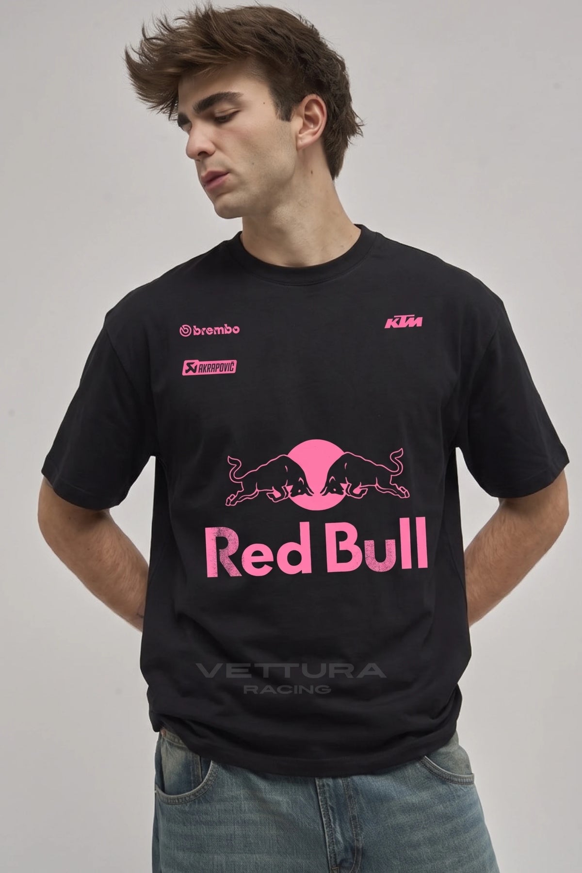 Man wearing the Red Bull racing t-shirt pink edition, front view with the pink charging bulls print