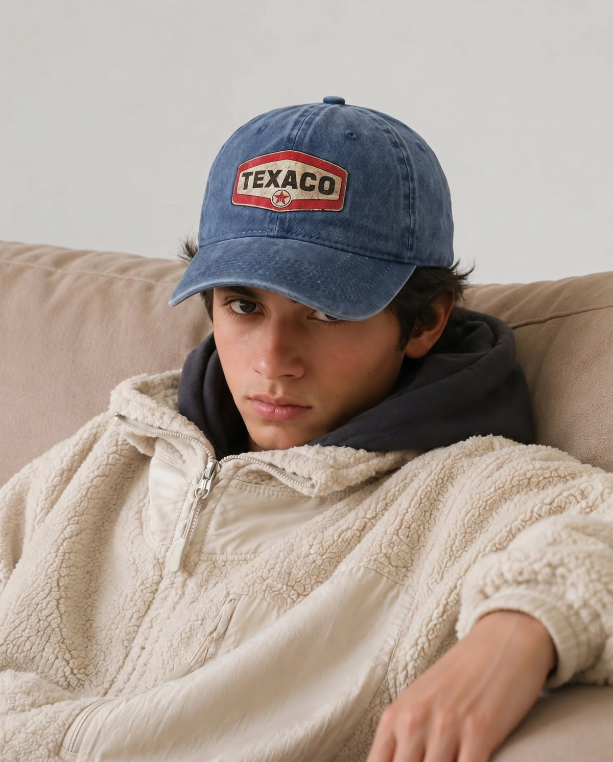 Model wearing the beige Texaco Motor cap