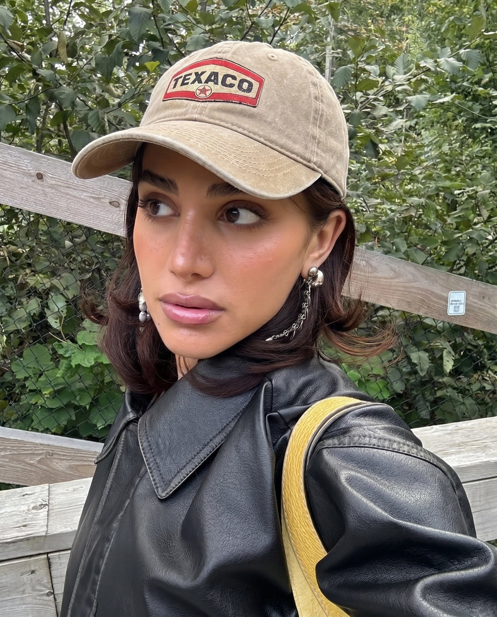 Navy Texaco Motor cap worn on the street