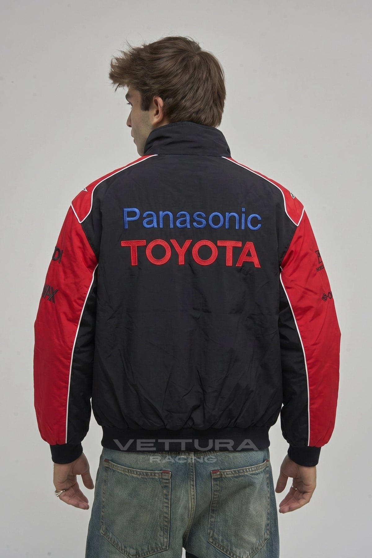 Toyota Panasonic racing jacket in black worn on the street