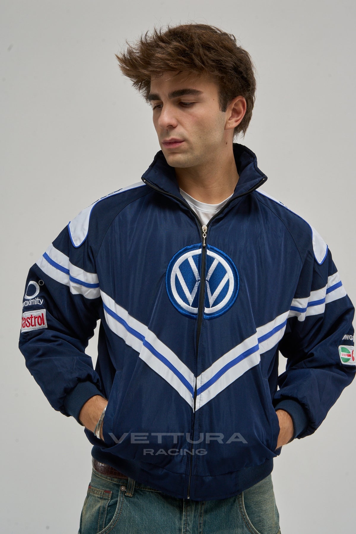 Volkswagen vintage racing jacket styled with jeans in daylight