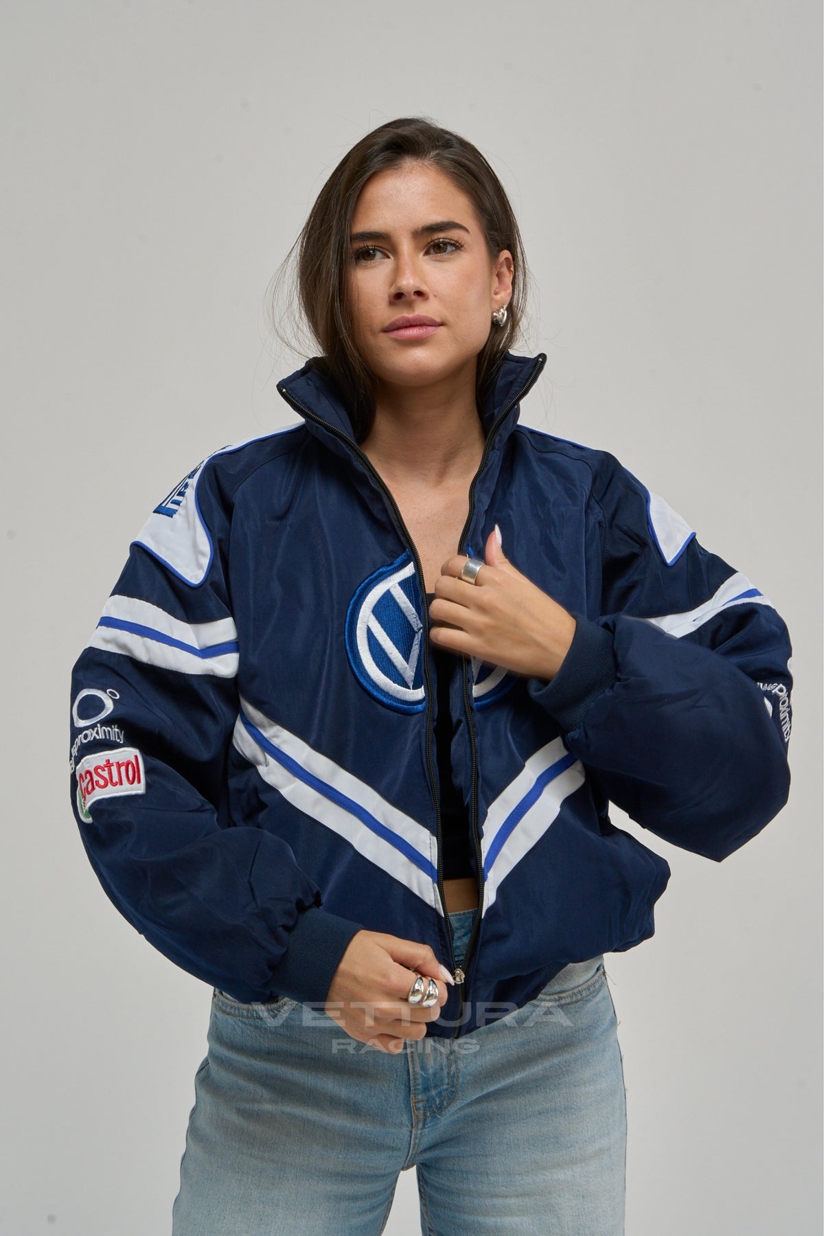 Model wearing the Volkswagen vintage racing jacket in navy, front view